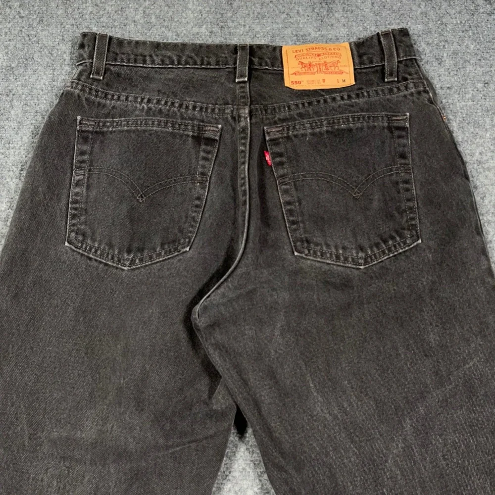VTG Levi's 550 Relaxed Fit Tapered Leg Jeans Mens 31x31 Black Made‎ In USA Faded